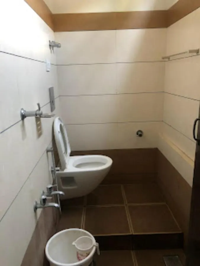 Redbell Suites Manjeri Hotel